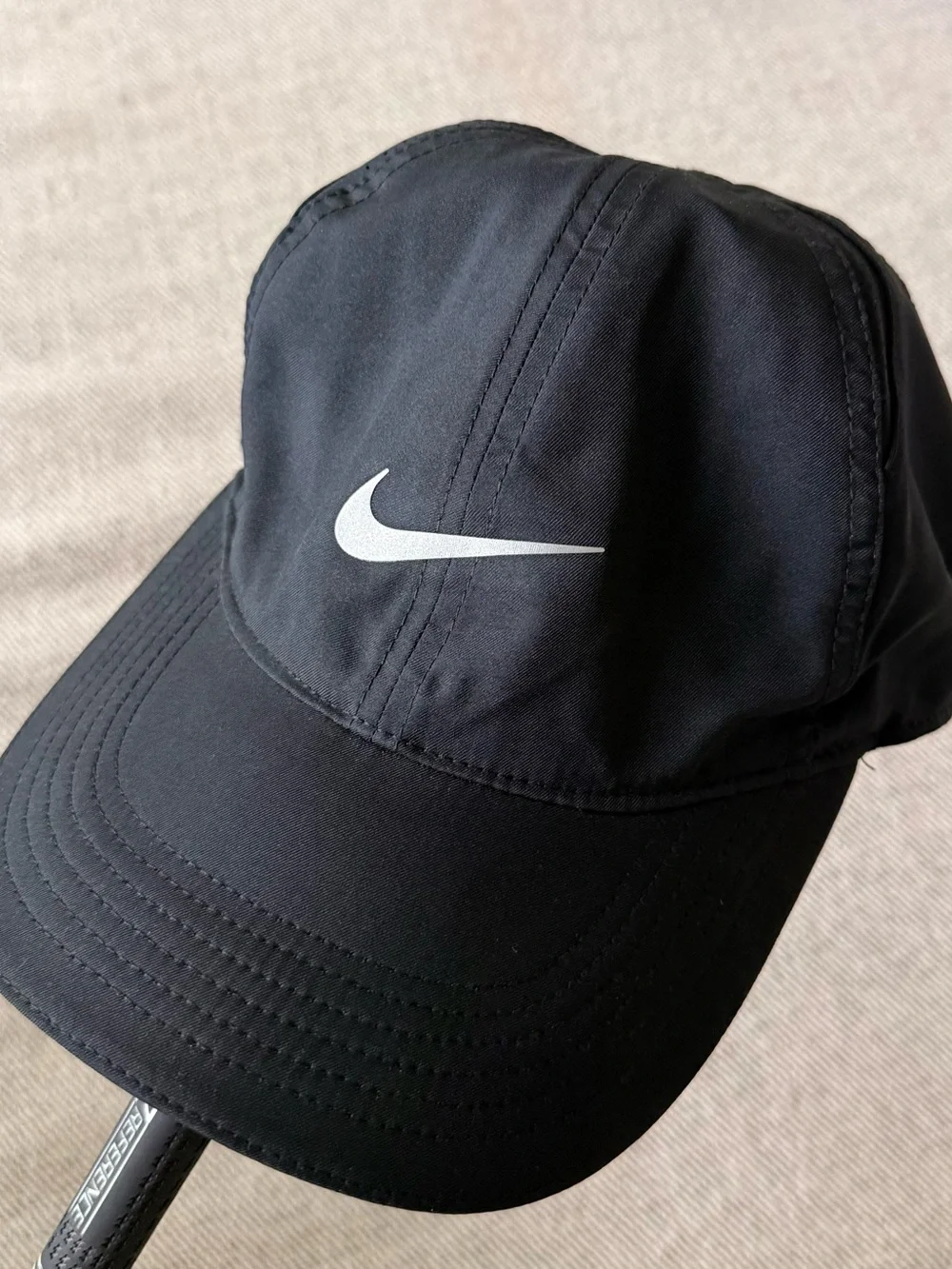 Nike Featherlight Dri-FIT Unstructured Black hat with reflective accents